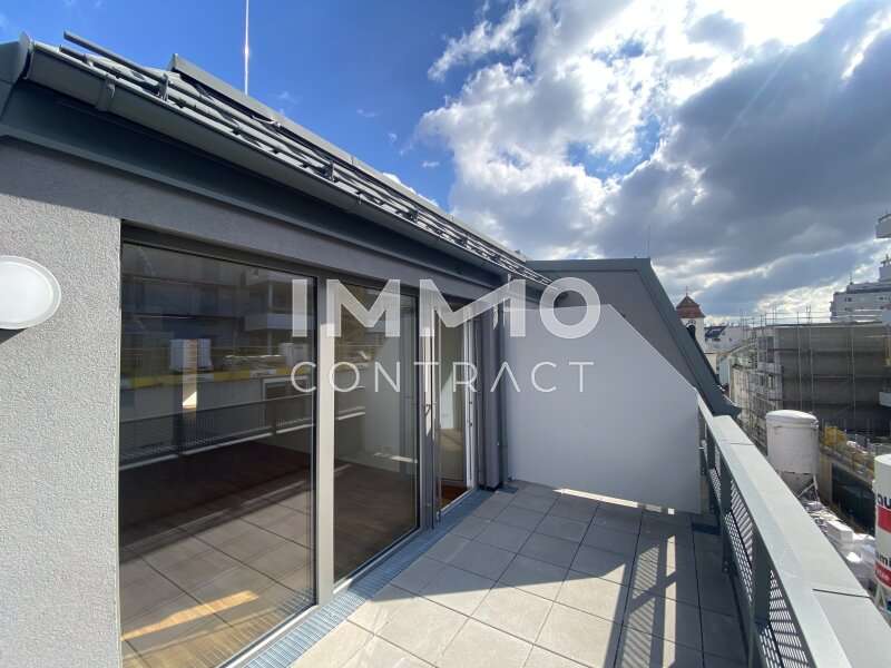 Dachterrasse mit Kirchturmblick - Bild 2 von 14 Dachgeschosswohnung in 1110 - 2