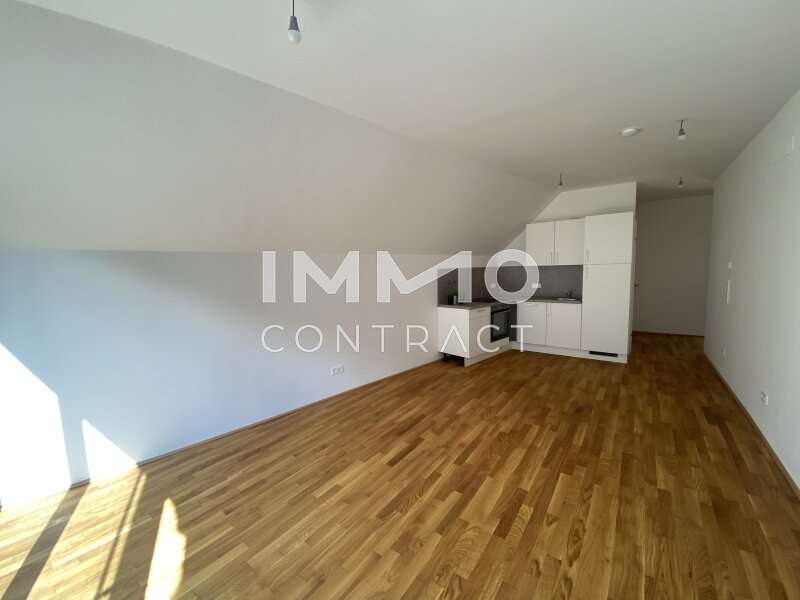 Wohnesszimmer - Bild 4 von 14 Dachgeschosswohnung in 1110 - 4