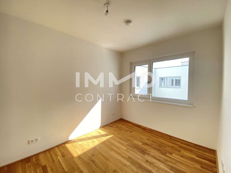 Schlafzimmer in den Innenhof - Bild 5 von 14 Dachgeschosswohnung in 1110 - 5