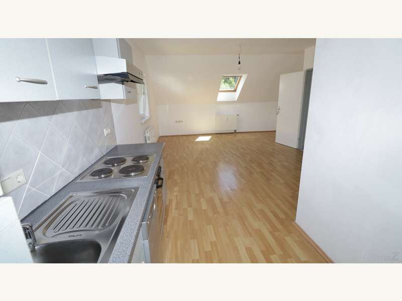 Wohnzimmer mit offener Küche. - Bild 1 von 28 Mietwohnung in 8052 - 1