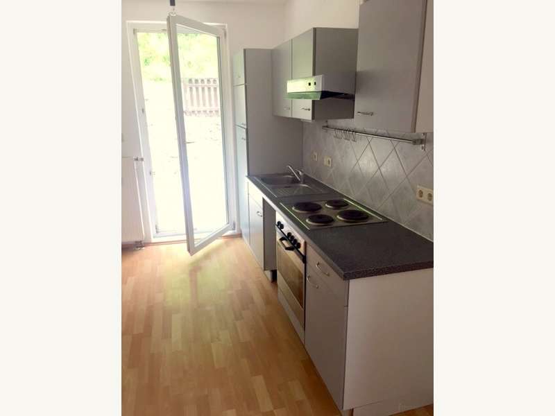 Küche mit Ausgang zur Terrasse - Bild 20 von 28 Mietwohnung in 8052 - 20